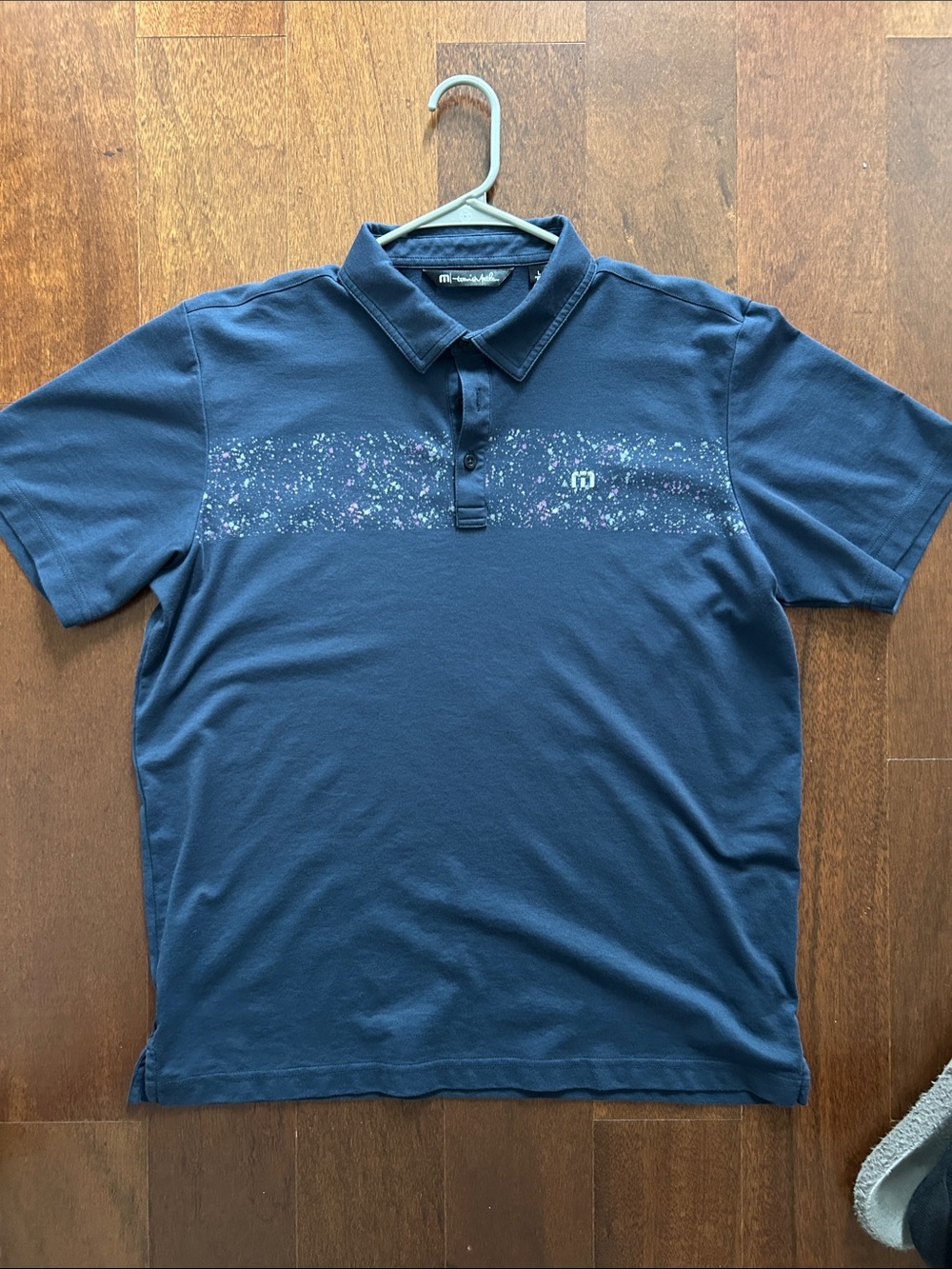 Travis Mathew Navy Polo with Speckled Chest Band